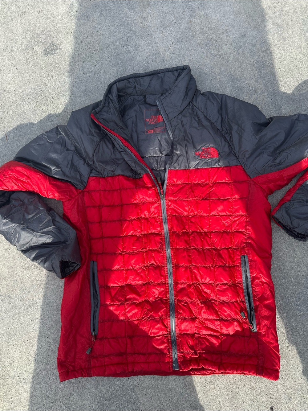 The North Face Men’s Red and Gray Puffer Jacket